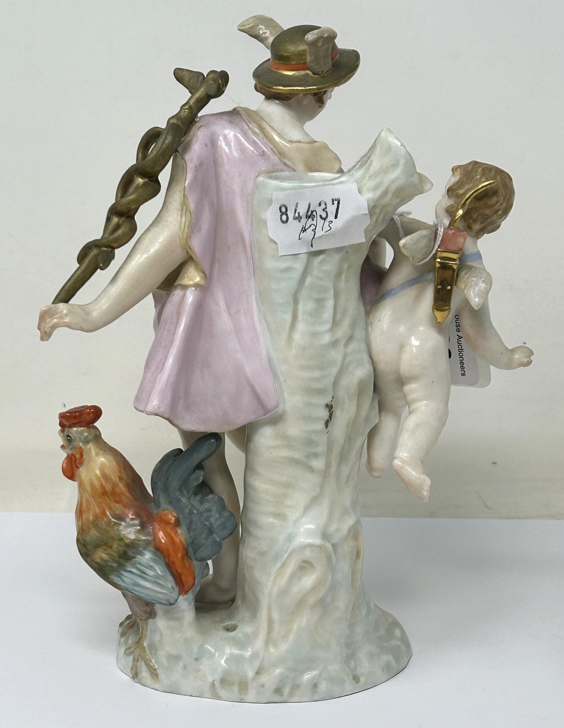 A Dresden group, of a man and cherub with a cockerel, 22 cm high - Image 2 of 3