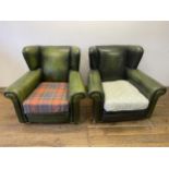 A pair of green leather armchairs, with later seats (2)