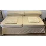 A Japanese modular day bed, with yellow upholstered covers, 190 cm wide