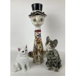 A Winstanley cat, 23 cm high, and two other cat figures (3)