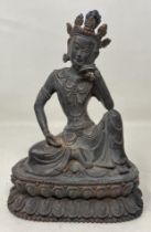 A bronze Buddha, 21 cm high