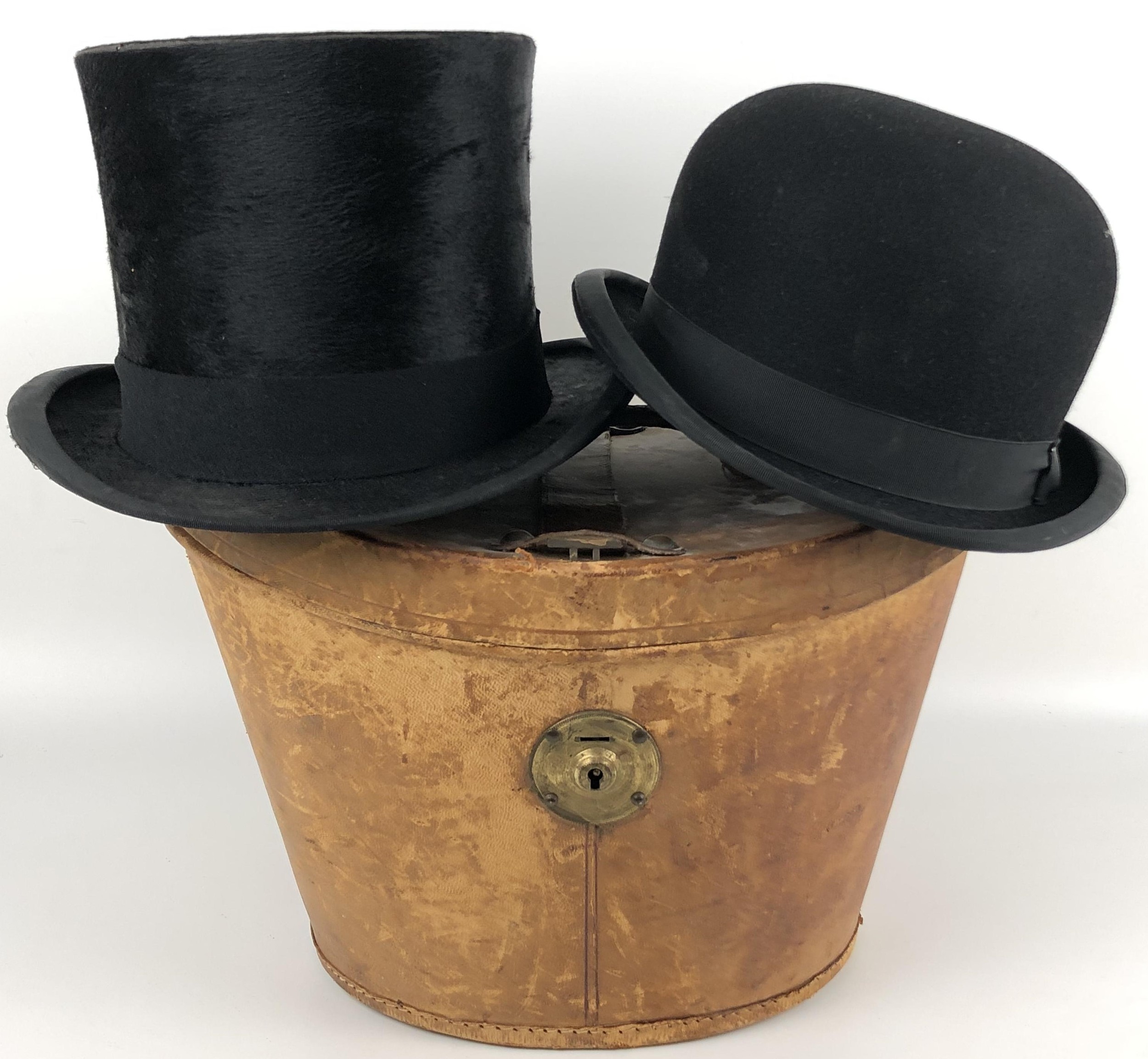 A moleskin top hat, in a hat box, and a bowler hat in a card hat box (2)