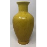 A Chinese yellow ground vase, decorated dragon, six character mark to base, 20 cm high No visible