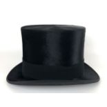 An A J White Hatter & Cap Maker, 74 & 63 Jermyn Street, silk top hat, in a Debenham & Freebody hat