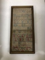 A sampler, by Sarah Deacon, dated 1766, 30 x 14 cm