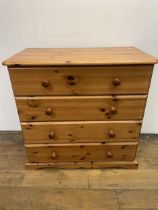 A pine chest, 81 cm wide, a pair of bedside chests, and a wardrobe (4)