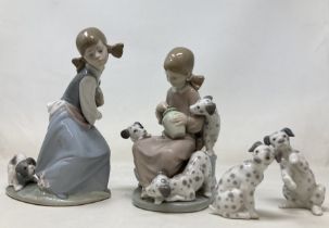 A Lladro figure of a girl with a puppy, another, a pair of Dresden figures, and assorted other