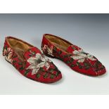 A pair of late 19th/early 20th century beadwork slippers, decorated flowers