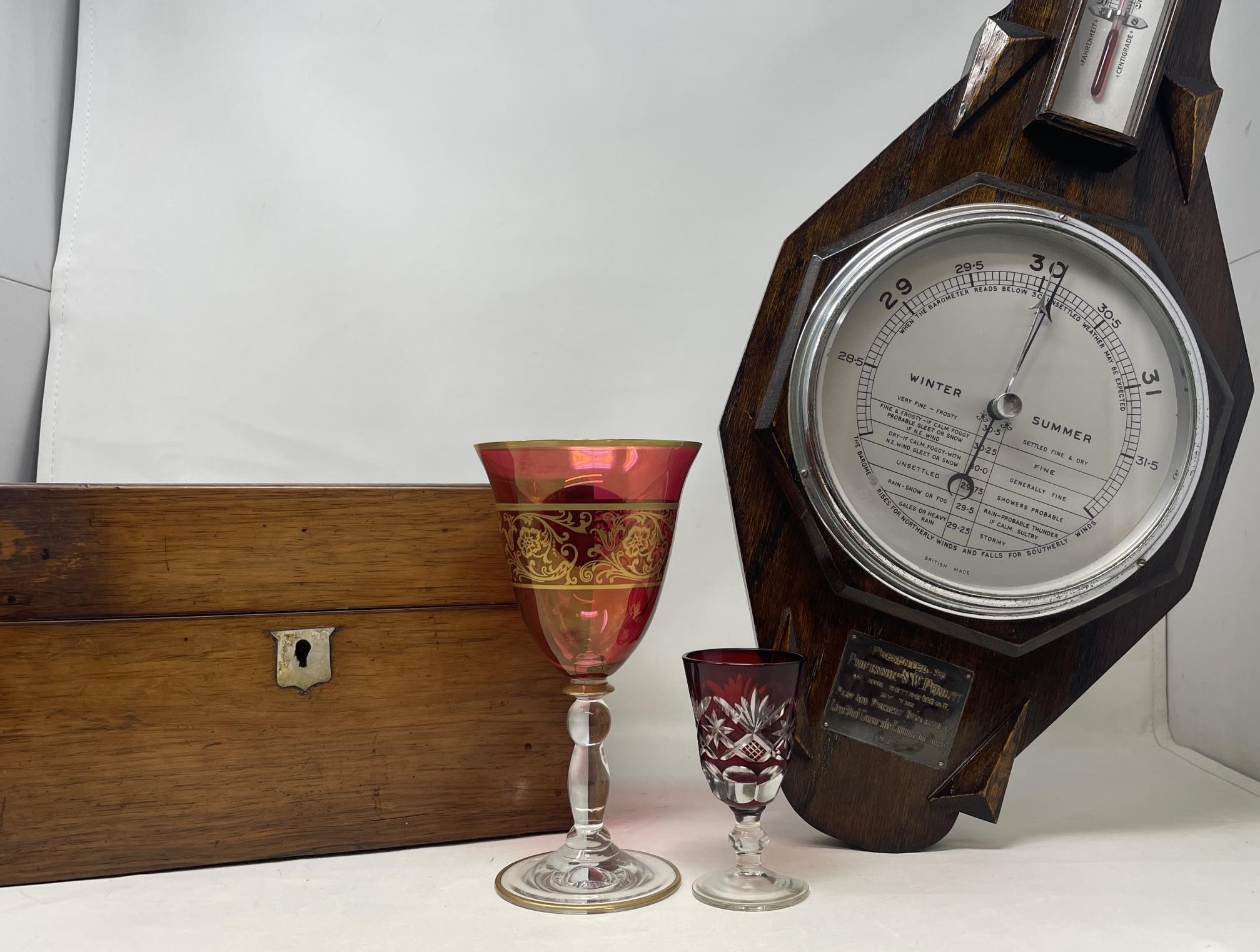 A rosewood box, a barometer, in an oak case, and assorted other items (4 boxes)