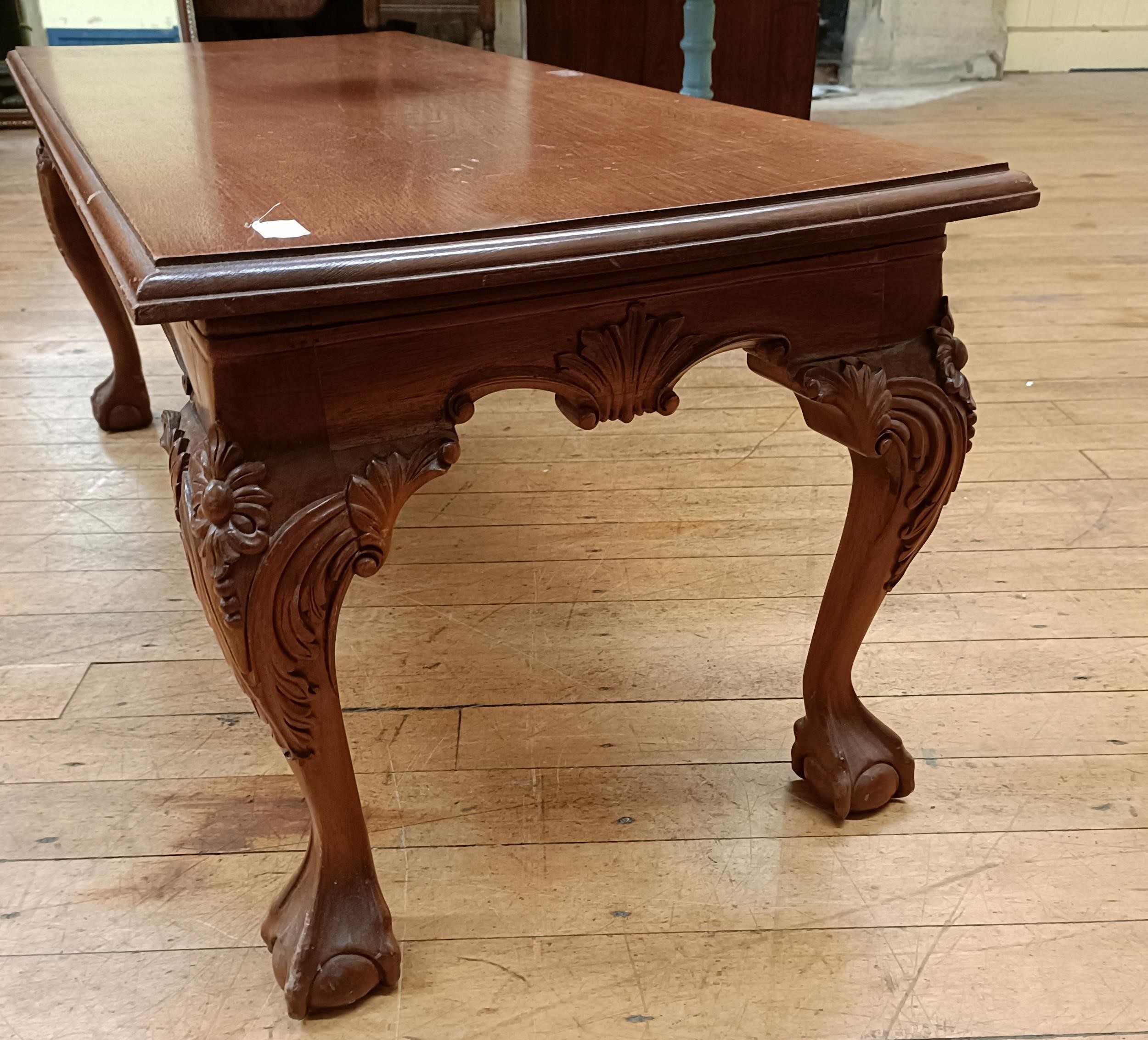 A mahogany low table, on carved cabriole legs with claw and ball feet, 107 cm wide and a painted - Image 4 of 5