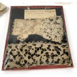 Royalty Interest: A lace glove and a section of lace, with a handwritten note 'Lacework by Queen