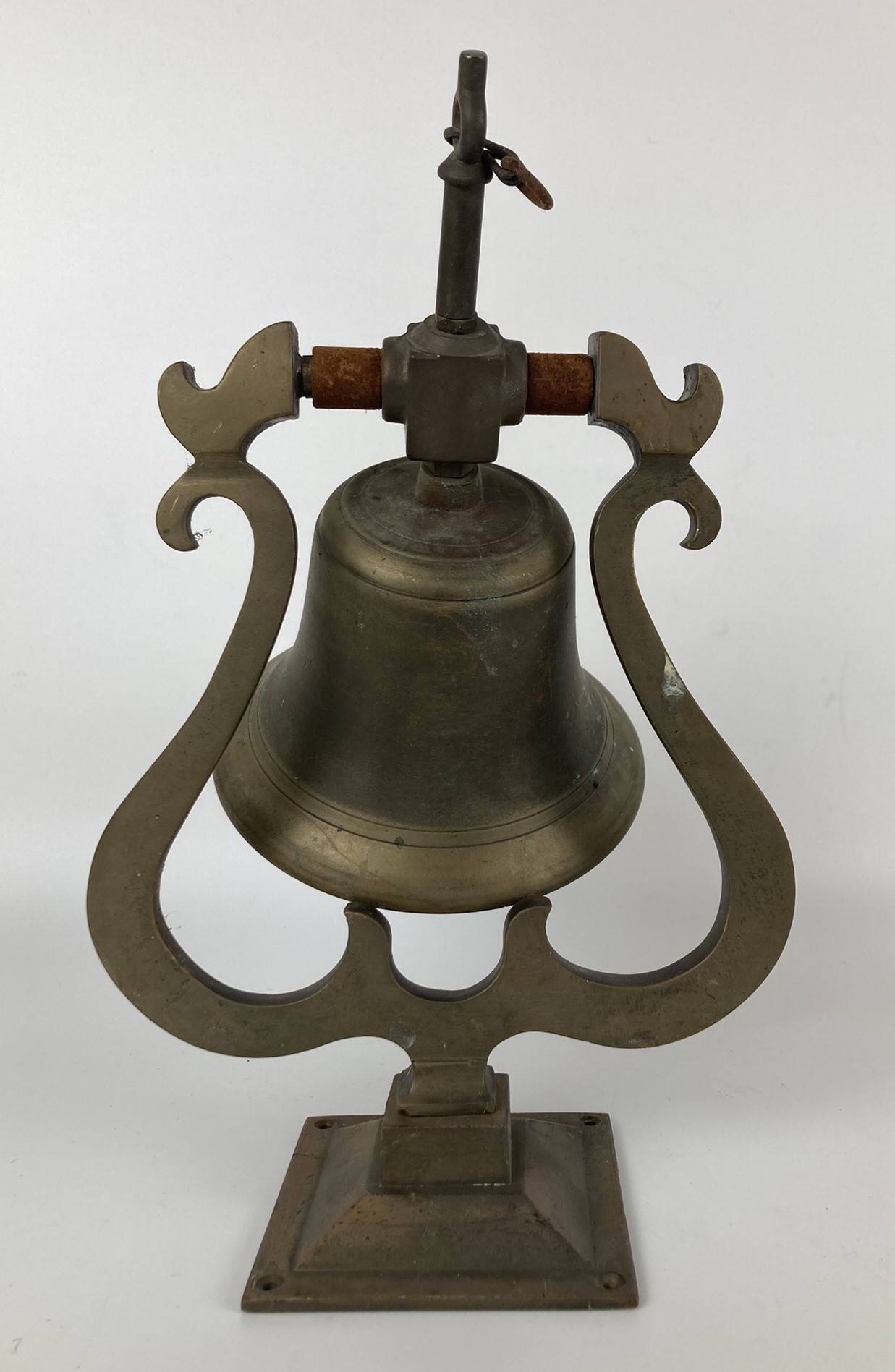 An early 20th century copper wall mounted bell, with a wrought iron mount and ringer, bell - Image 2 of 3