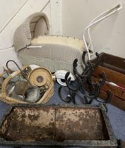 A cast iron animal trough, a wine holder in the form of horseshoes, a doll's pram and other items (