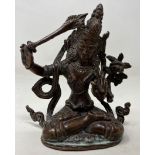 A bronze Buddha, 10 cm high