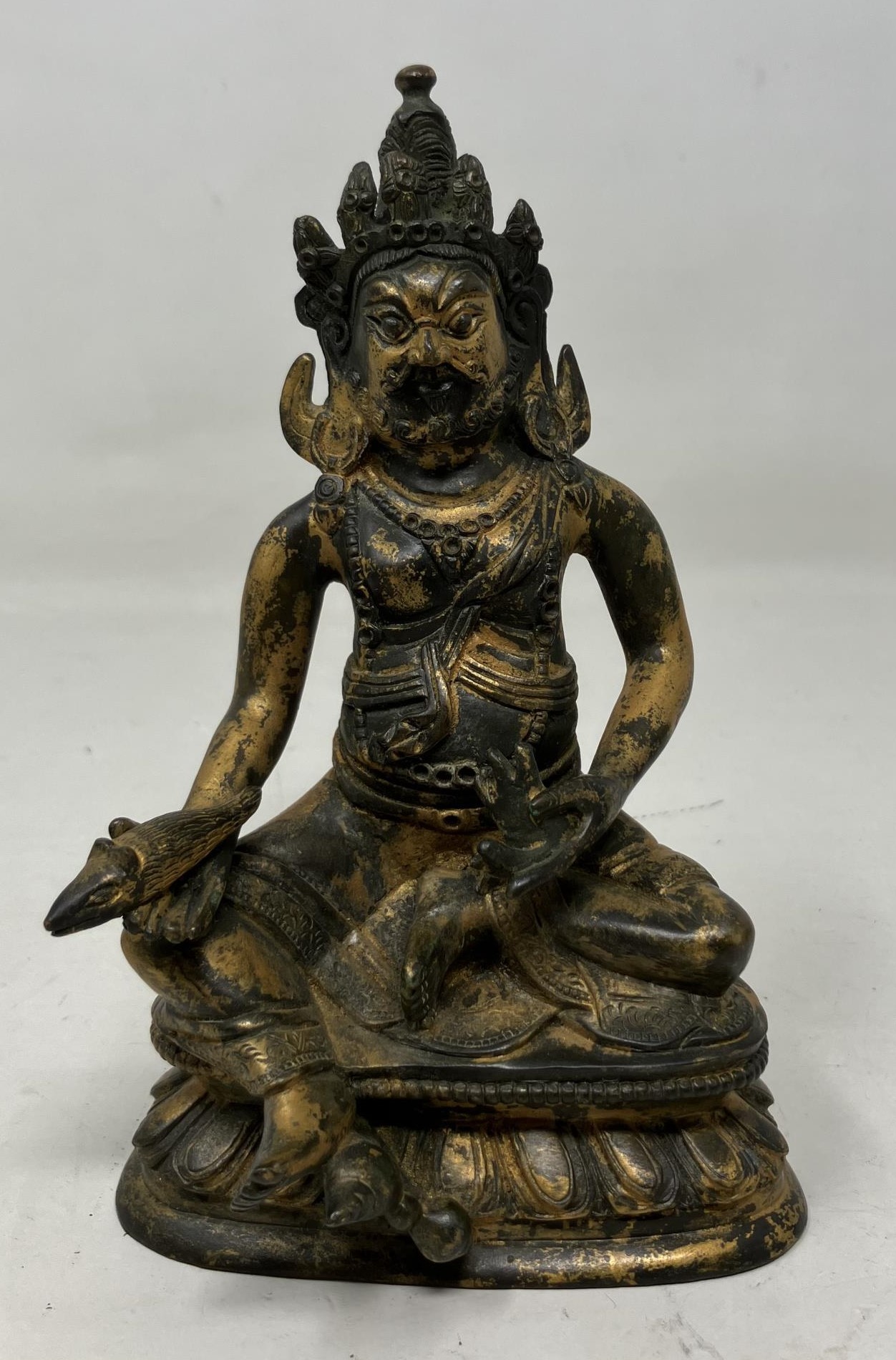 A gilt bronze Buddha, 15 cm high