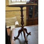 A copper and brass coal bucket, with lions head handles, 45 cm diameter, an oak table and a wine