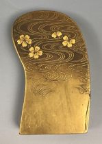 A Japanese lacquered box and cover, of shaped rectangular form, decorated flowers in a lake, 6 cm