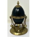 A late 19th century novelty inkstand, in the form of a brass mounted Emu egg, 23 cm high