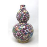 A Chinese one thousand flower double gourd vase, character mark to base, 22 cm high
