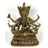 A gilt metal Buddha, 33 cm high