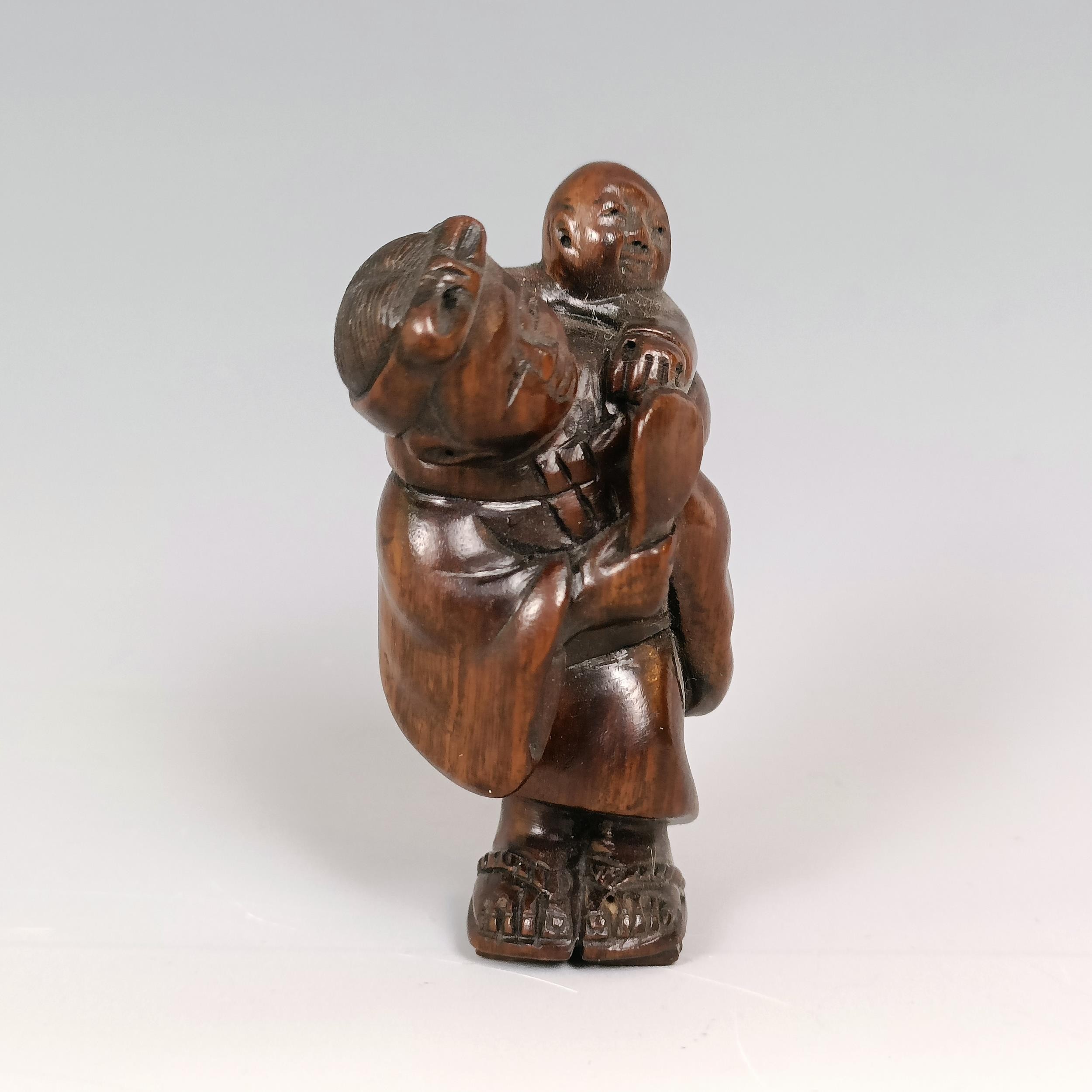 A carved wooden netsuke, in the form of an octopus, 5 cm wide and a carved wooden netsuke, in the - Image 7 of 9