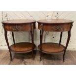 A pair of French style oval two tier tables, 60 cm wide (2)