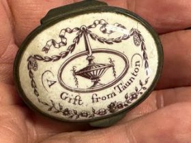 A George III enamel pill box, the lid reading A Gift From Taunton