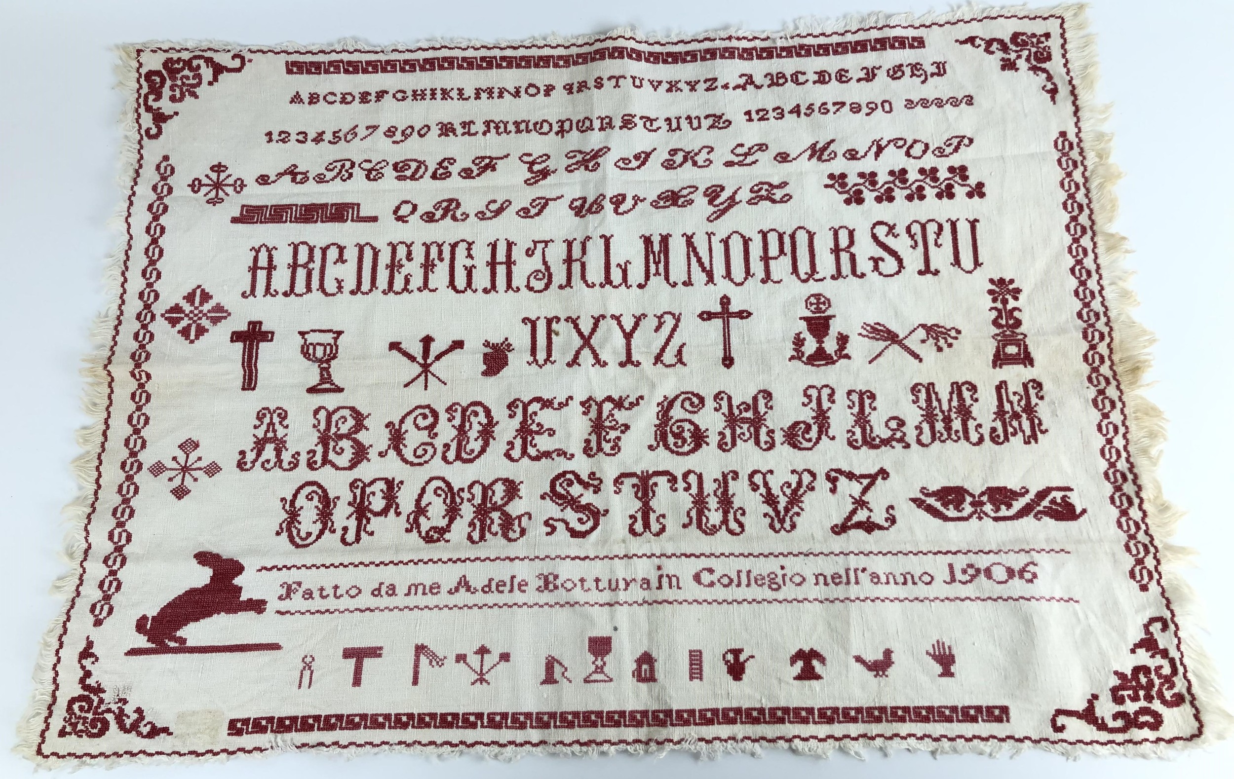 An early 20th century sampler, signed Adele Botturain, dated 1906, 39 x 57 cm - Image 2 of 3