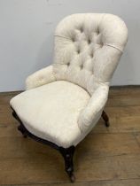 A button back nursing chair, two mahogany armchairs, and a Windsor chair