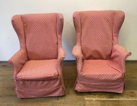 A pair of Parker Knoll type wingback armchairs, another, a mirror, a two tier trolley, a two tier