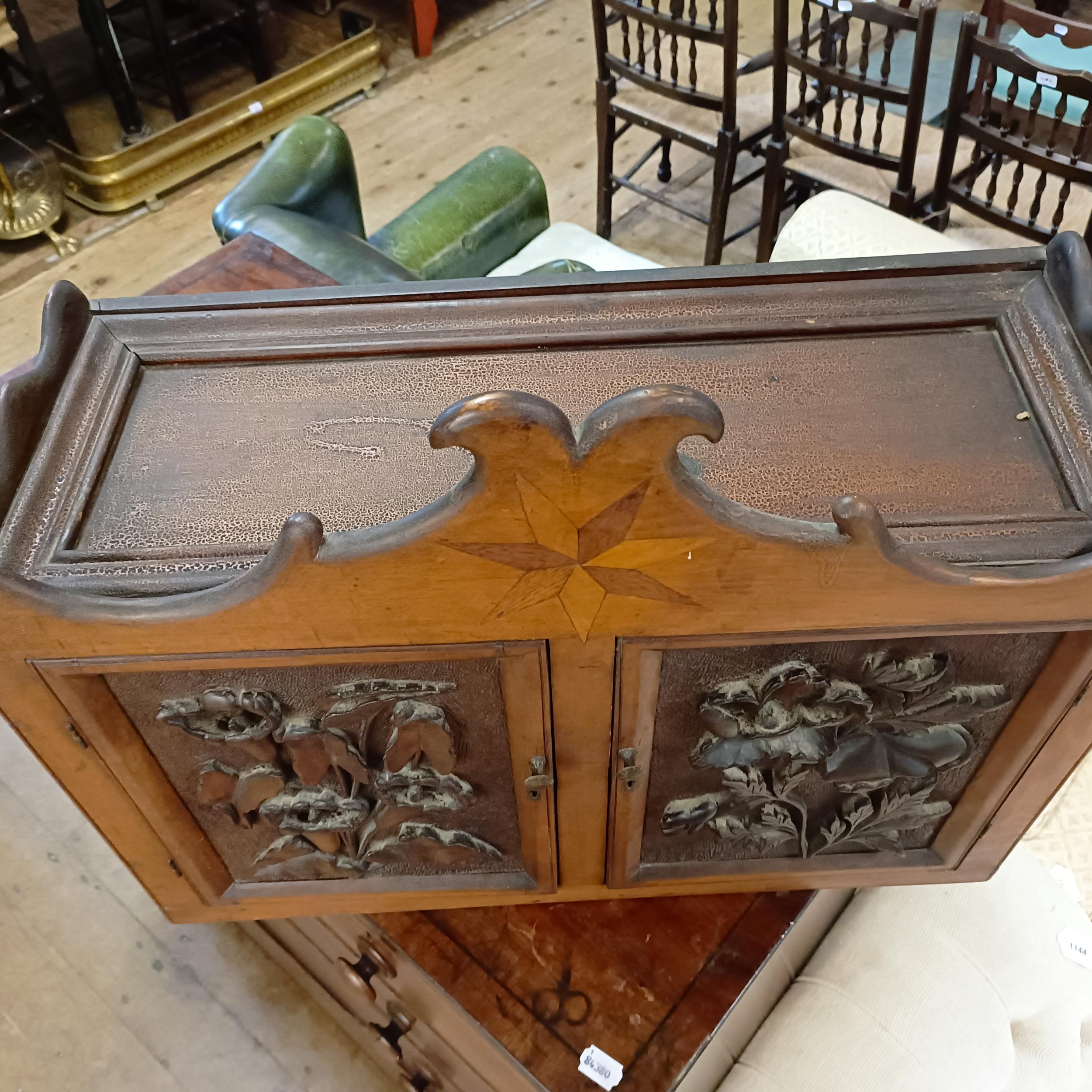 A walnut cupboard, decorated with carved flowers, 54 x 64 cm - Image 3 of 10