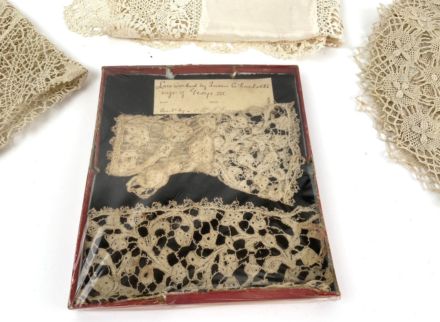 Royalty Interest: A lace glove and a section of lace, with a handwritten note 'Lacework by Queen - Image 2 of 5