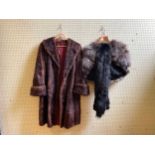A fur coat, a fur cape and a fur stole (3)