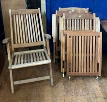 A set of four teak folding chairs (4)
