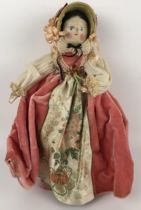 A Grodnertal style painted wooden doll, 30 cm Provenance: Sold on behalf of SNCBS