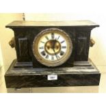 A mantel clock, in a metal faux marble case, 38 cm wide