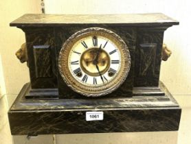 A mantel clock, in a metal faux marble case, 38 cm wide