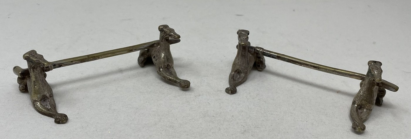 A pair of novelty silver plated knife rests, in the form of greyhounds, a brooch in the form of a - Image 6 of 11