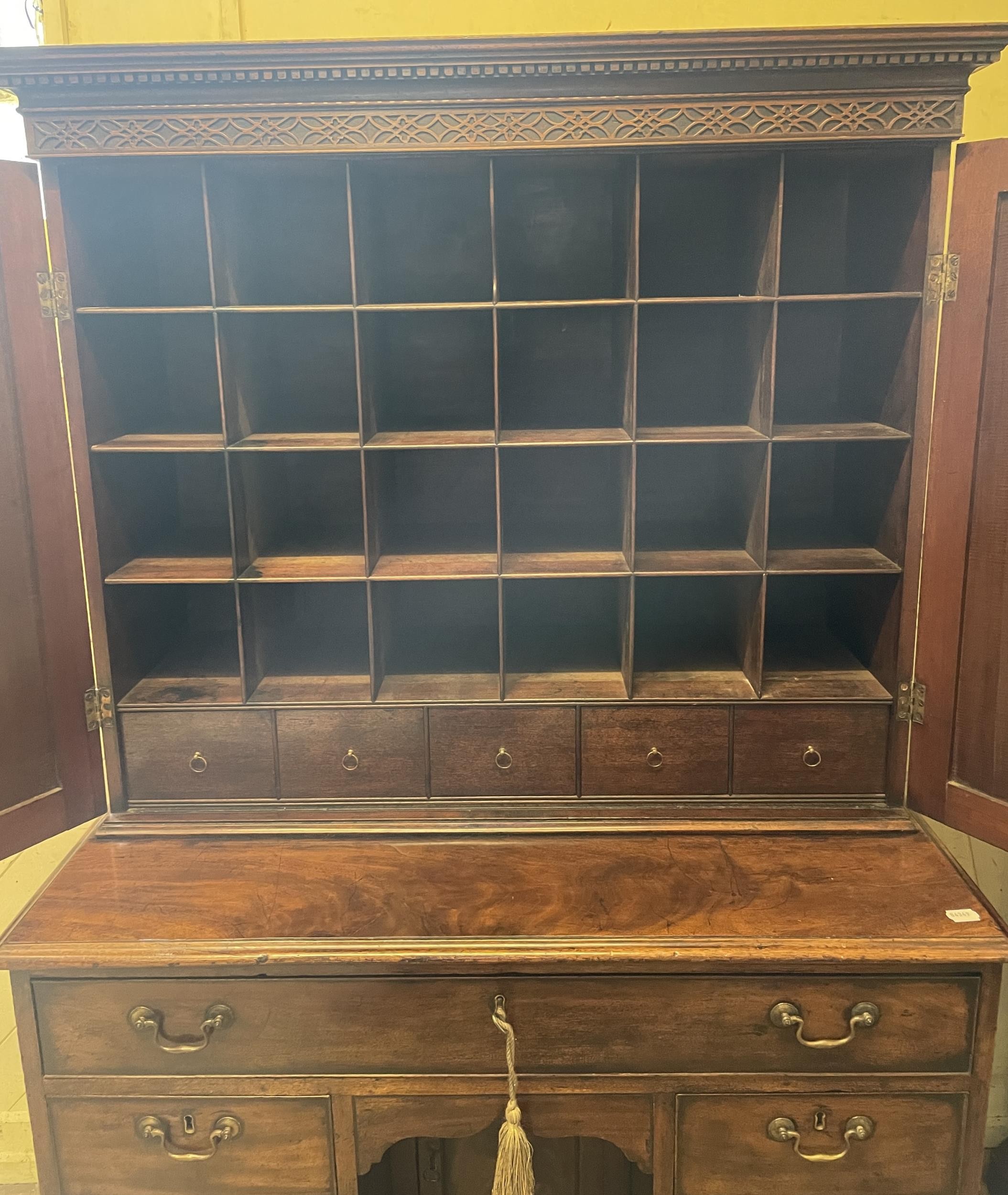 A 19th century mahogany kneehole desk, with a bookcase top having a pair of panel doors, opening - Image 2 of 9