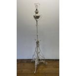 A painted wrought iron standard lamp, 160 cm high