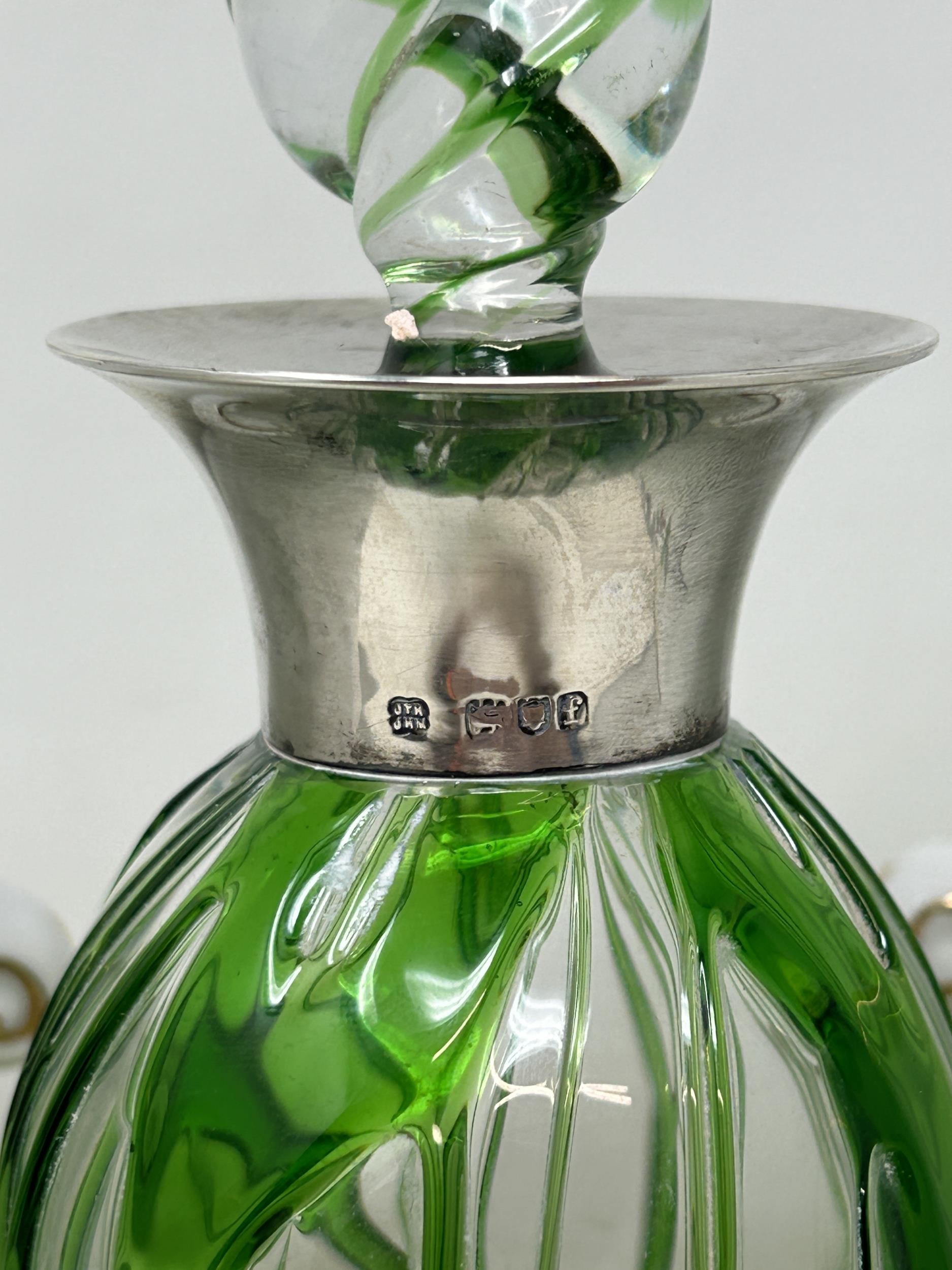 A 20th century clear and green glass decanter, with a silver mount, and a pair of porcelain wine - Image 2 of 6