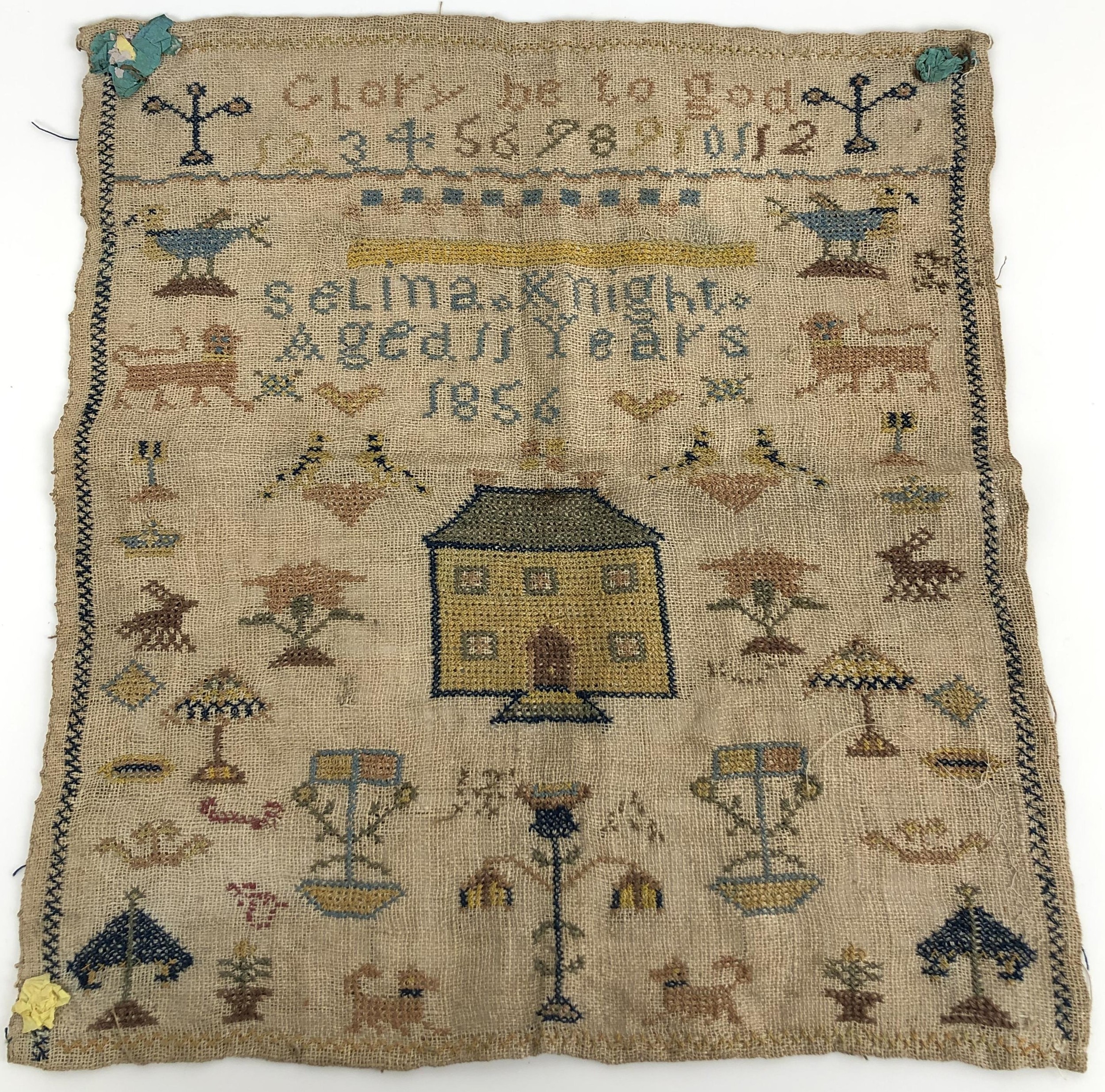 A 19th century sampler, signed Selina Knight, aged 11, dated 1856, 35 x 33 cm
