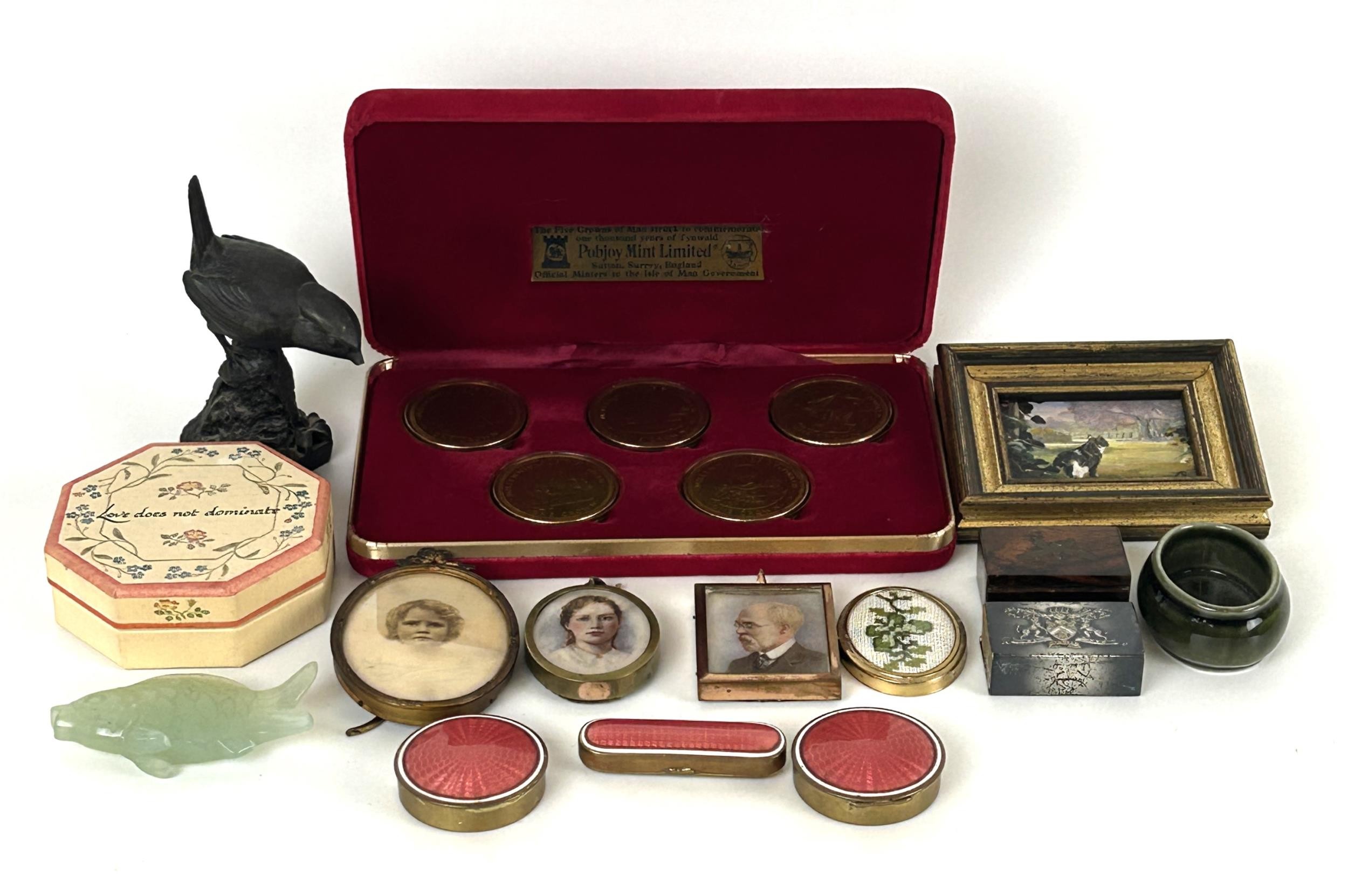 A gilt metal and enamel box, a set of coins and other items
