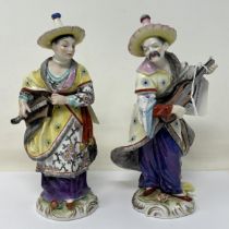 A pair of Dresden figures, of a man and a woman in Chinese dress, 20 cm high (2)