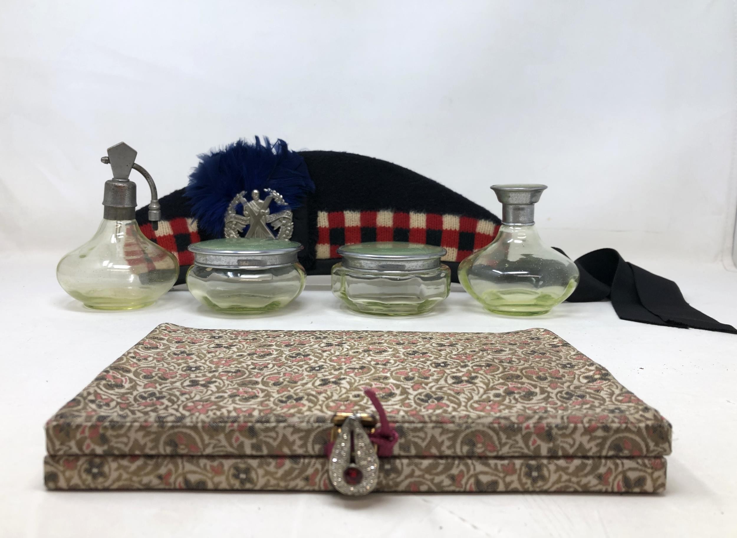 An Art Deco style silk purse, a Glengarry hat, and part of a dressing table set Provenance:  Sold on