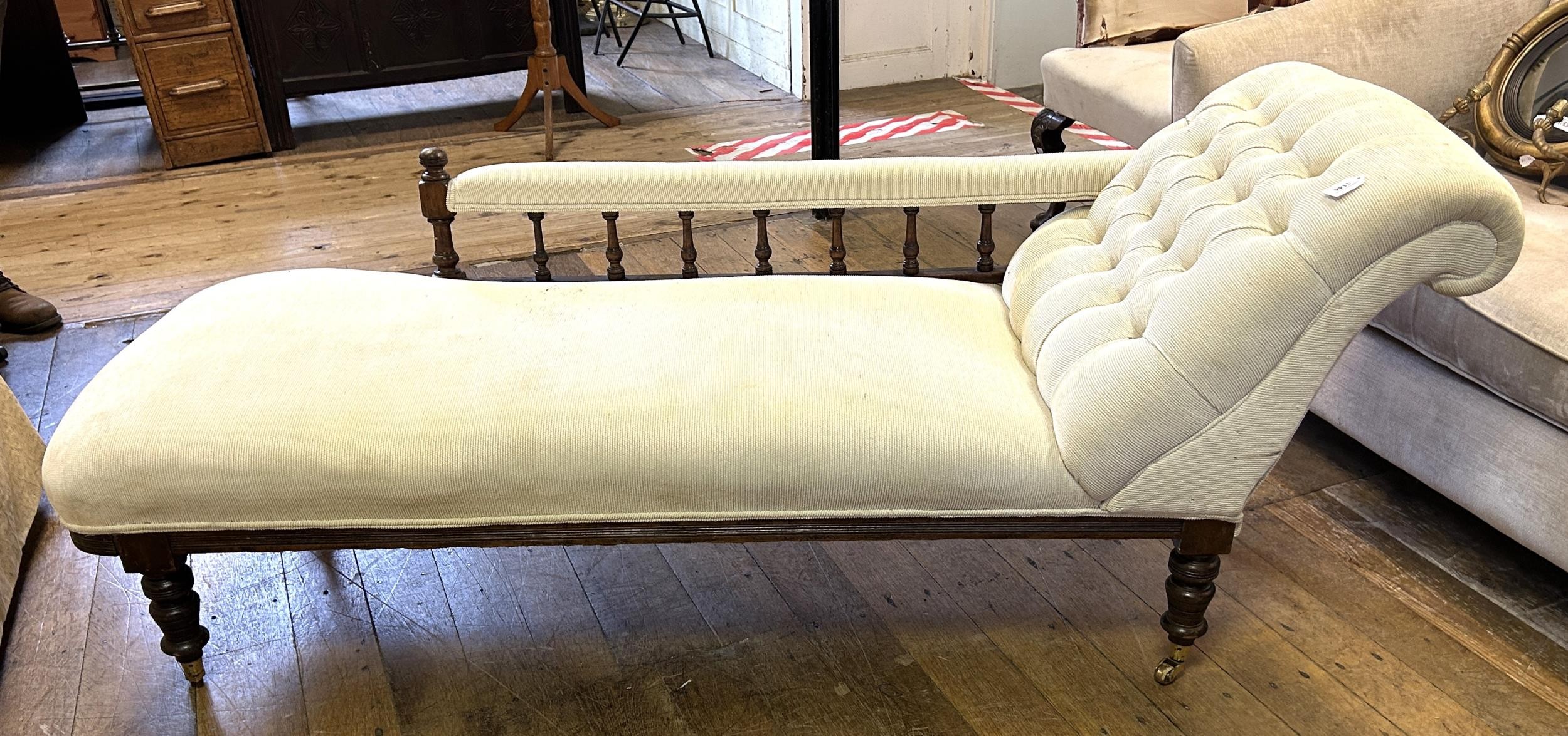 An oak framed chaise longue