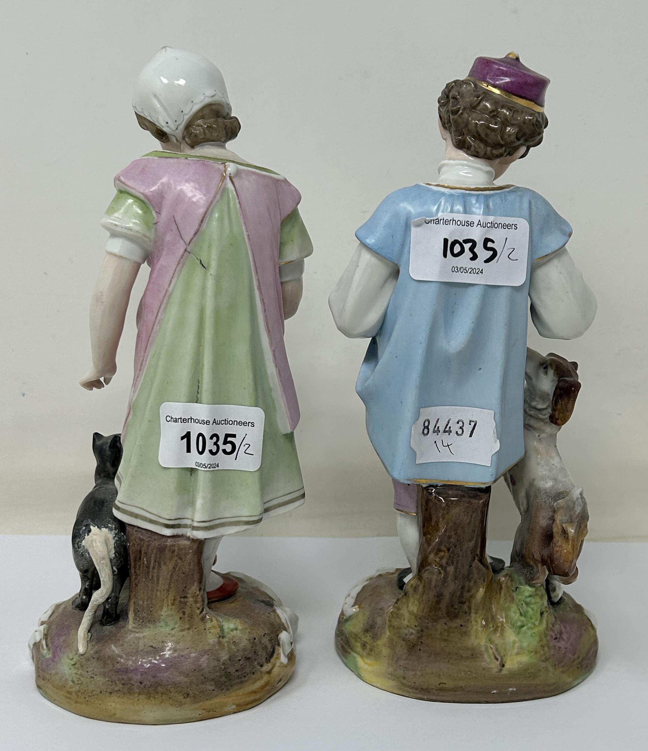 A pair of Dresden figures, of a young boy with a dog and puppy, and a young girl with a cat and - Image 4 of 5