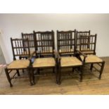 A set of eight oak spindle back dining chairs (6+2)