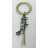 ***Withdrawn*** A silver and mother of pearl baby's rattle, in the form of a bird, Birmingham