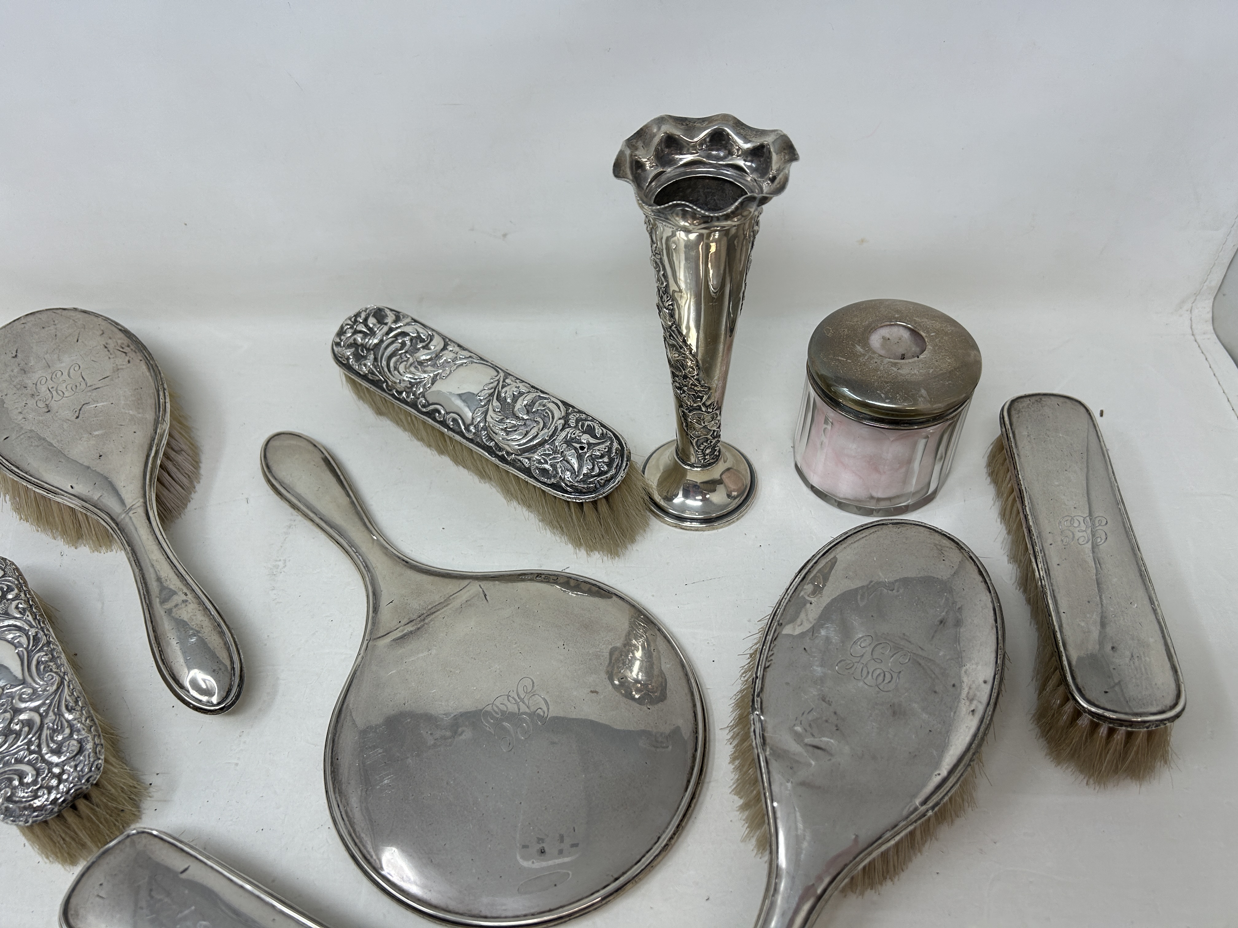 A George V silver posy vase, a silver backed mirror, assorted brushes, and a glass box with a silver - Image 4 of 4